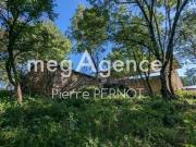 Fermette à rénover avec serres agricoles