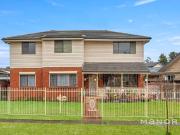 First Time Offered | Expansive Dual Level Family Home on...