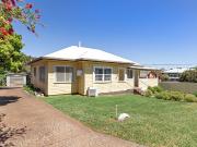 First Time Offered Prime Location Renovator's Delight!