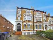 Flat to rent in Worple Road, London SW20