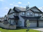 FOR RENT: Two car garage half duplex in Leger