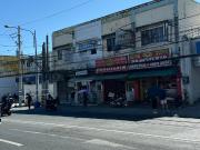 For Sale: Commercial lot with existing comm structures...