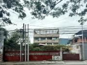 For sale Commercial Lot with old delapidated house...
