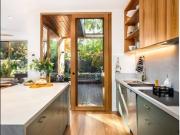 Four bedroom family home blending timber warmth, space...