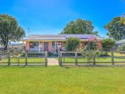 FOUR BEDROOM ON ACRES IN TOWN!