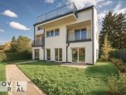 Freiraum trifft Wohnkomfort Wohnung mit Garten und Terrasse