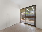 Freshly painted beachside unit with rear yard & 3rd room!