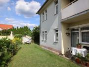 FREUNDLICHE WOHNUNG MIT GARTENNUTZUNG UND PARKPLATZ