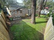 Fully fenced, North end, Caravan included