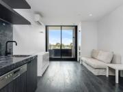 Fully furnished 2 bedroom apartment with backyard and...