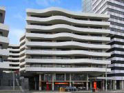 fully furnished top floor apartment with corner balcony