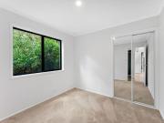 Fully Renovated Modern Home on Elevated, Sun Filled Block