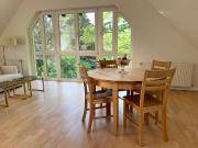 Furnished attic apartment in Grunewald flooded with...