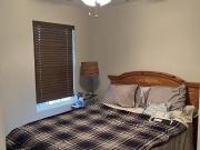 Furnished bedroom private bathroom