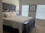 Furnished bedroom with ensuite private bath