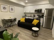 Furnished one bedroom + den basement suite