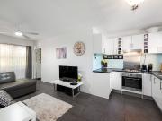 Furnished Pristine Ground Floor Unit Steps from IGA &...