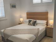 Furnished Unit walking distance to back beach