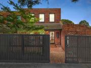 Spacious retro 3 Bedroom townhouse with 2 Car Spaces set...
