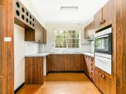 GENEROUS APARTMENT LIVING IN A QUIET TREE LINED STREET
