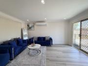 Spacious Family Living with Multiple Living Areas in a...