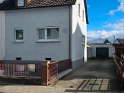 Gepflegte Doppelhaushälfte mit großem Garten und Garage