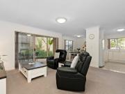 Gorgeously maintained unit with two courtyards