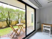 Grand T2 petite terrasse parking