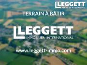Grand terrain constructible dans une ville dynamique....