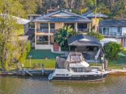 GRAND WATERFRONT LIVING SPACE, STYLE & UNMATCHED LIFESTYLE!