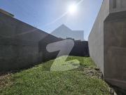 Grey Structure With Large Lawn And Privacy Walls Ready...