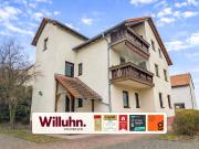 Großzügige EG Wohnung mit Kamin, Gartenanteil & Garage –...