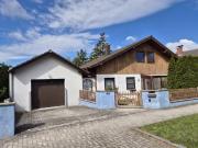 Großzügiges Einfamilienhaus mit Traumgarten und Garage