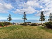 Ground Floor Coastal Gem with Stunning Ocean Views