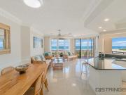 GROUND LEVEL BEACHFRONT LIVING step out to the sand'