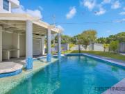 Ground level beachfront living step out to the sand'