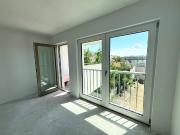 Grünblick & Cityflair: 51m² Neubau mit Balkon & Sauna...