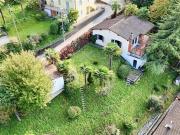 Grundstück mit Baugrund und Cottage zu renovieren