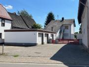 Haus mit grossem Grundstück,3 Garagen
