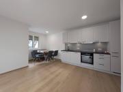 Erstbezug: Helle 3 Zimmer Wohnung mit großzügigem Garten