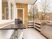 Helle Wohnung mit großem Balkon und Parkettboden in...