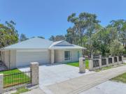 HIGH QUALITY 3 BED 2 BATH BRICK HOME WITH DOUBLE GARAGE!