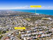 High set Brick Home in a Prime Beachside Community