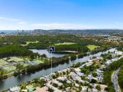 Holiday Inspired Waterfront Living in a Gated Resort