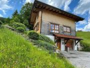 Holzblockhaus an der Skipiste