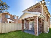 NEAR NEW 4 BEDROOM TOWN HOME WITH DOUBLE GARAGE WALK TO...