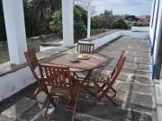 House with large balcony and garden