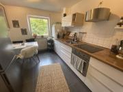 Ideale 2 Zimmerwohnung mit Balkon in Man.