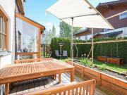 IHR RUHEPOL in den Bergen – Moderne Gartenwohnung mit Stil