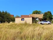 Im Dorf Bure stehen 3 Garagen auf einem Baugrundstück...